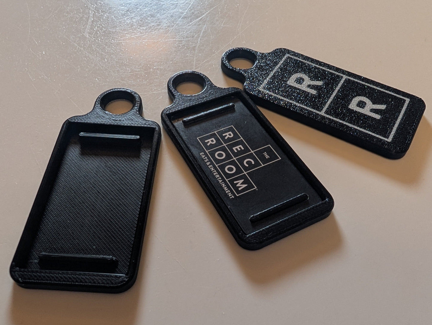 The Rec Room Game Band keychain holder